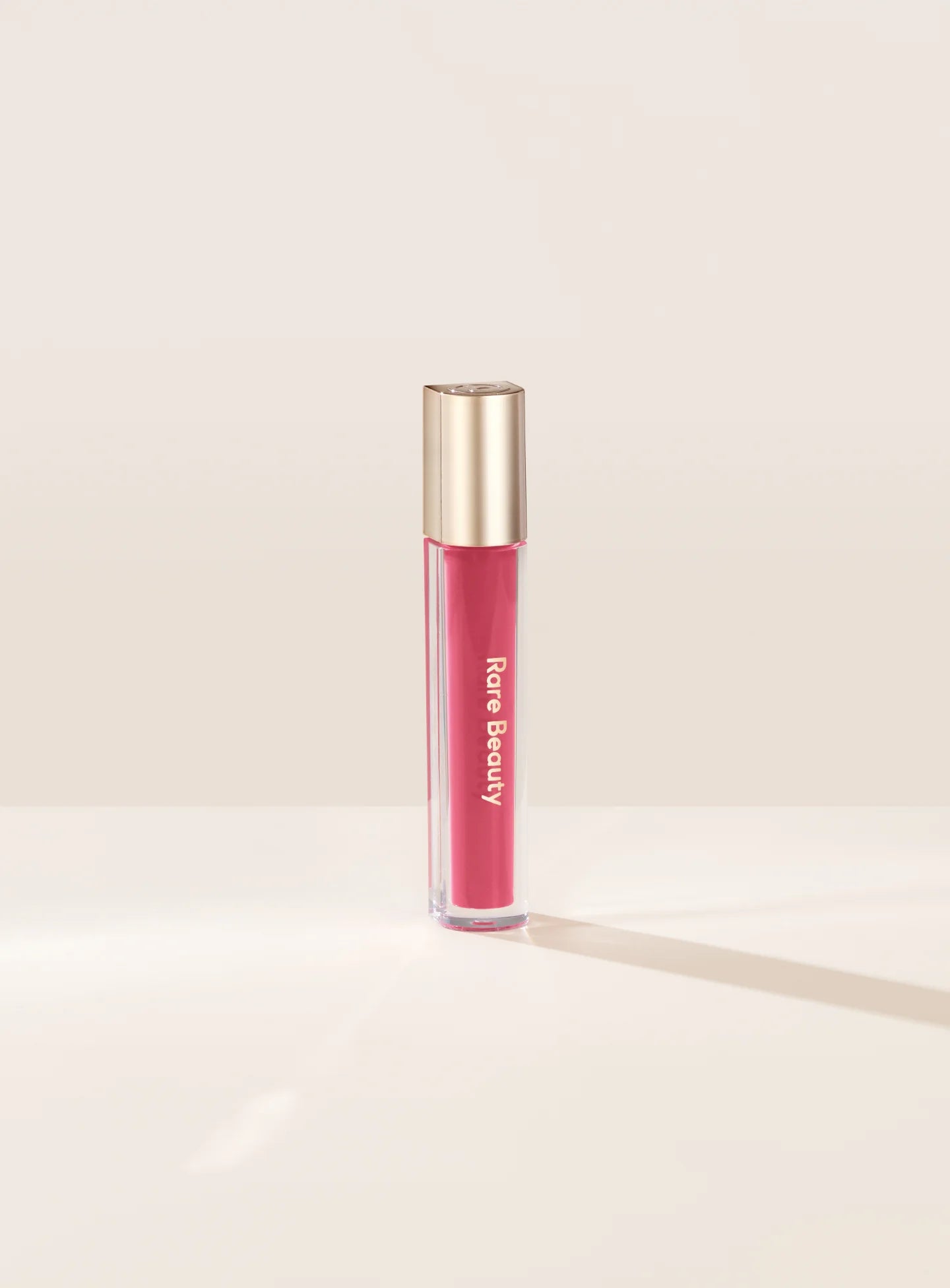 Rare Beauty Stay Vulnerable Glossy Lip Balm ملمع الشفاه من رير بيوتي